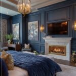 Sophisticated Navy Blue Paneled Bedroom with Fireplace